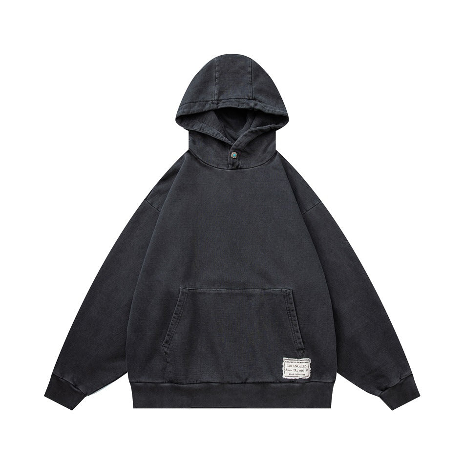 Dark gray washed-look pullover hoodie, front flat lay, with kangaroo pocket and a small woven label