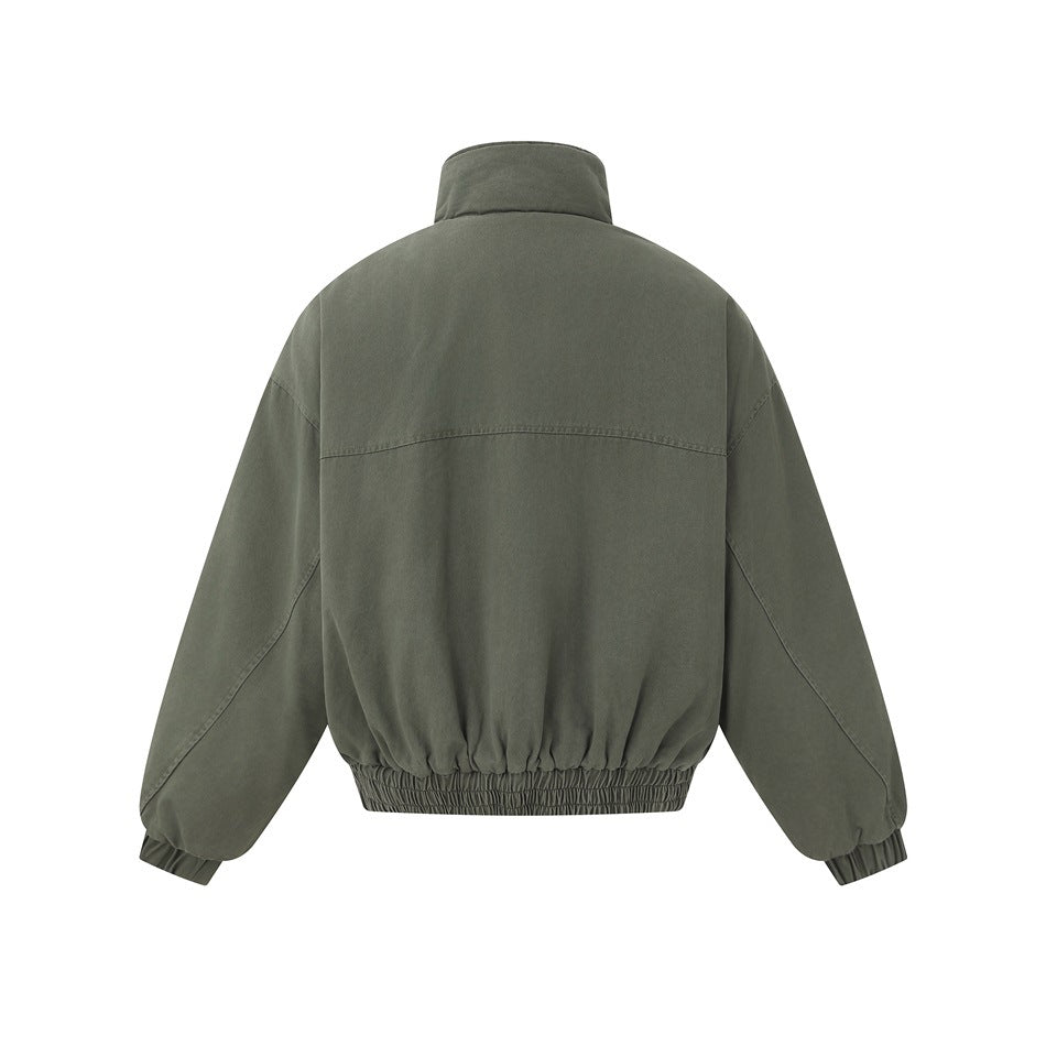 Back view of an olive-gray jacket with a high collar, curved seam across the shoulders, and gathered cuffs and hem.