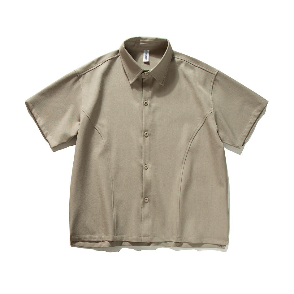 Khaki short-sleeve button-up shirt with pointed collar and curved front seams, flat lay front view