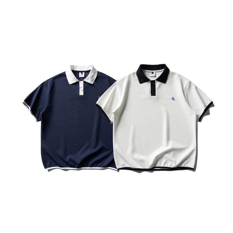 Two short-sleeve polo shirts shown from the front: navy with a white collar and trim, and white with black trim.