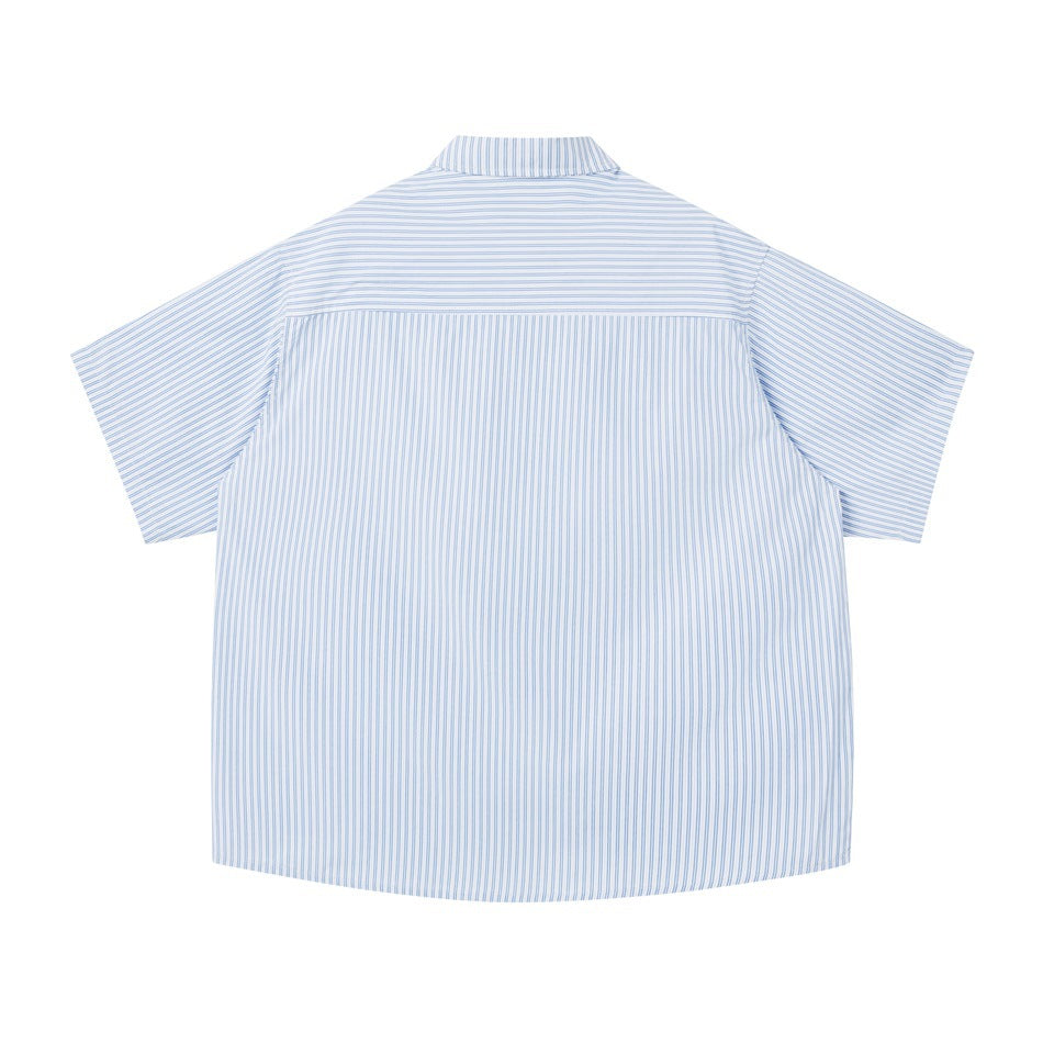 Back view of light blue striped short-sleeve shirt with horizontal-striped yoke and vertical-striped body