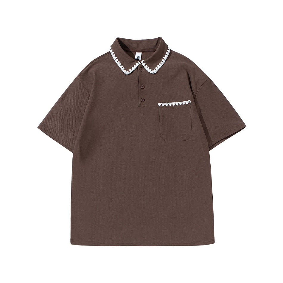 Brown short-sleeve polo shirt with white scalloped trim on the collar and chest pocket, flat front view