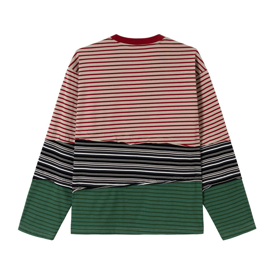 Back view of a long-sleeve color-block shirt with red and cream, black and white, and green horizontal stripes.