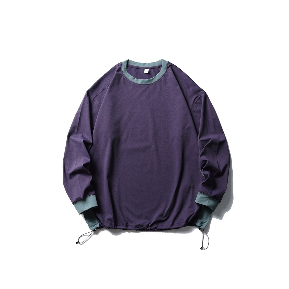 Purple crewneck pullover with green-gray ribbed collar and cuffs and drawcord hem, flat lay