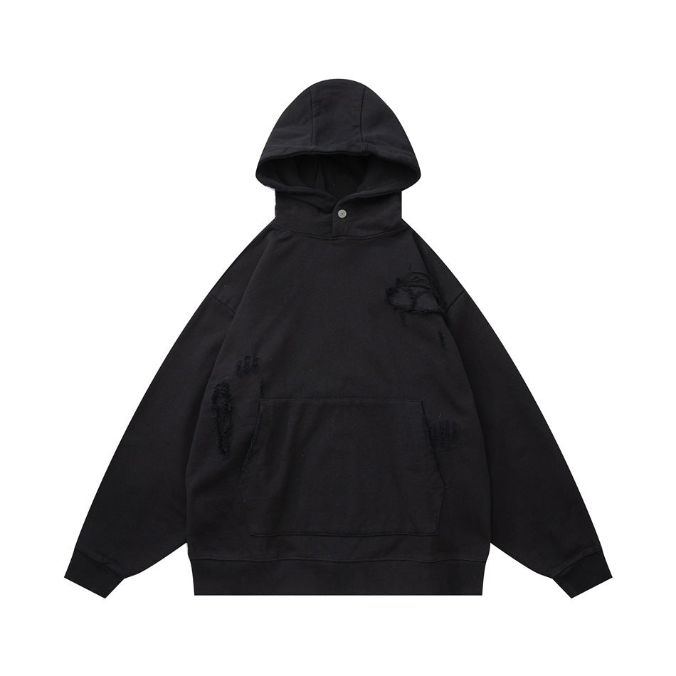 Black pullover hoodie flat lay, front view, with kangaroo pocket, ribbed cuffs and distressed frayed patch details