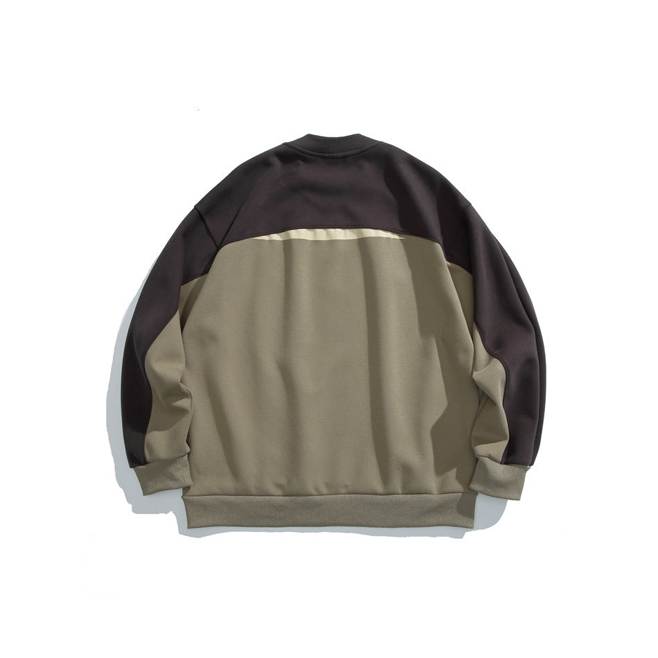 Back of a color-block crewneck sweatshirt, with a taupe body and dark brown sleeves and upper back.