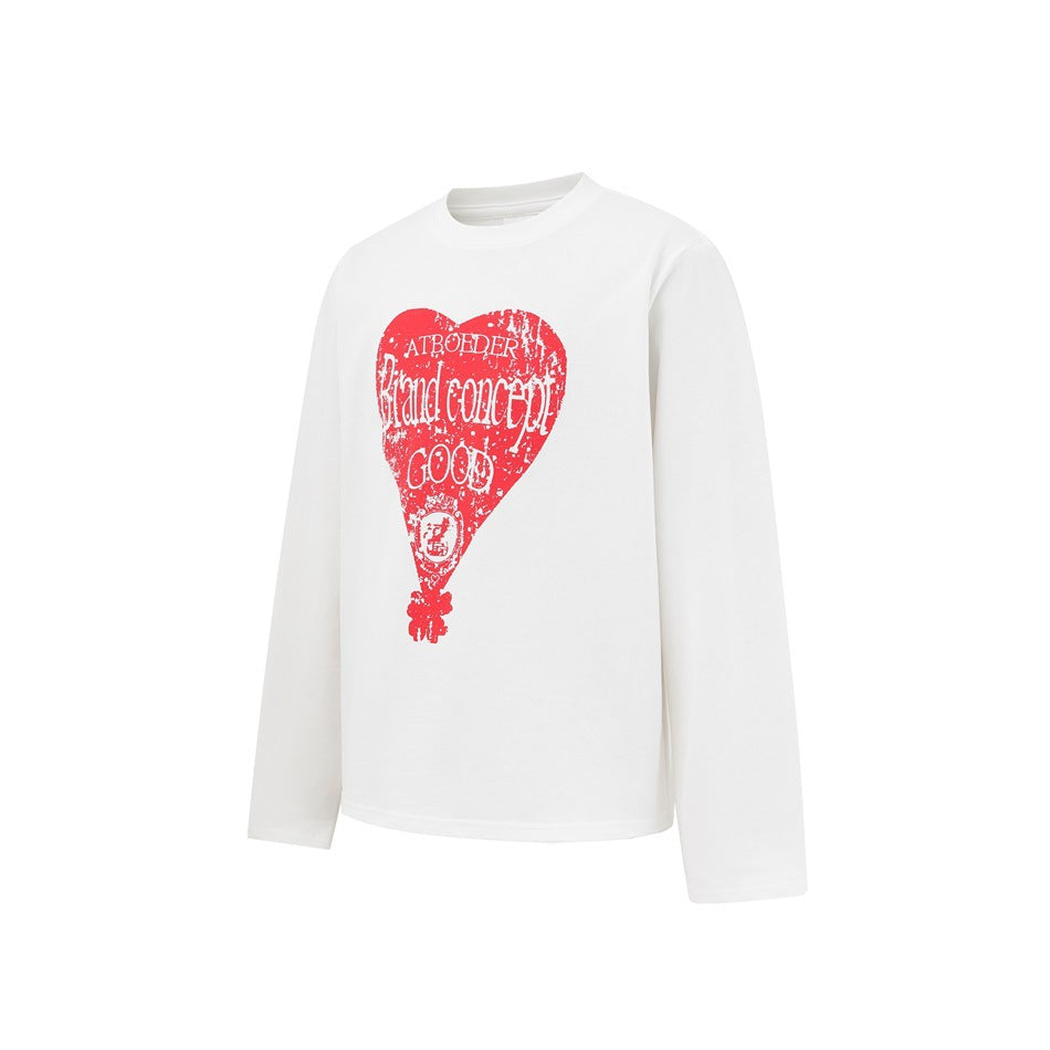 White long-sleeve T-shirt with a red distressed heart graphic, shown at an angle