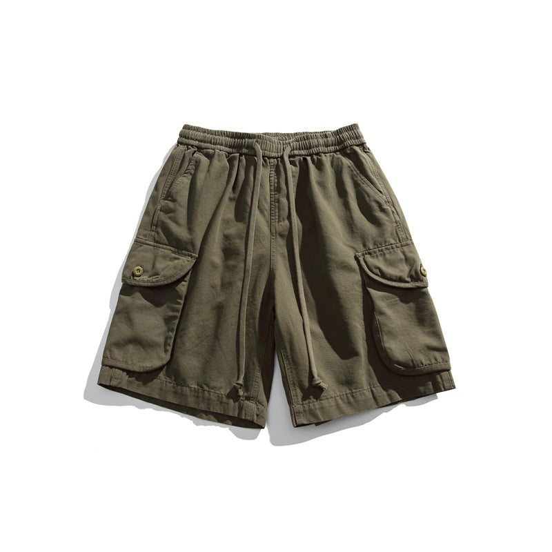 Army green cargo shorts flat lay with drawstring waist and button-flap cargo pockets