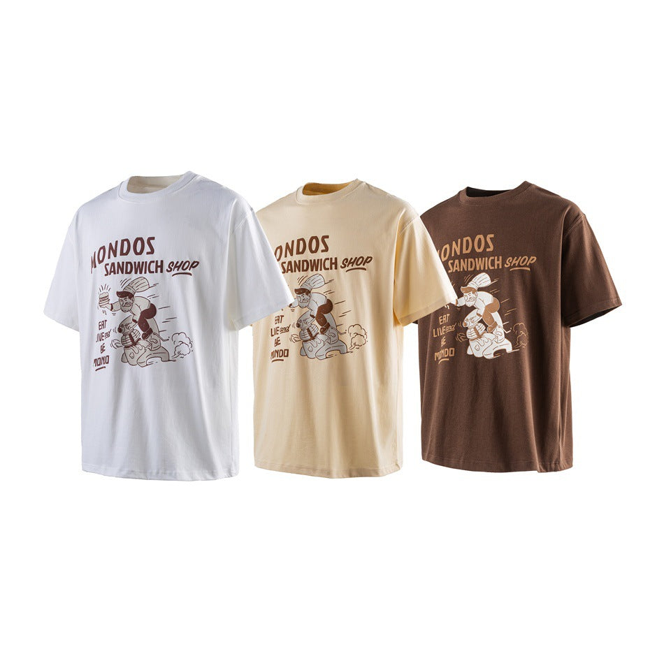 Three short-sleeve graphic T-shirts in white, cream, and brown, each with a sandwich-shop illustration.