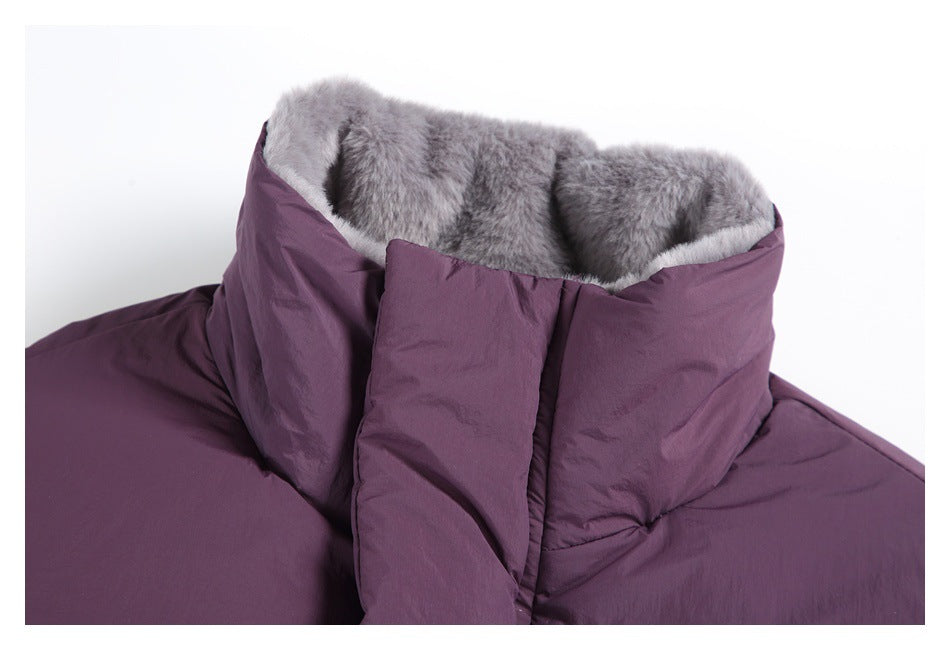 Close-up of the plum jacket's tall collar with gray plush lining and a covered front closure.