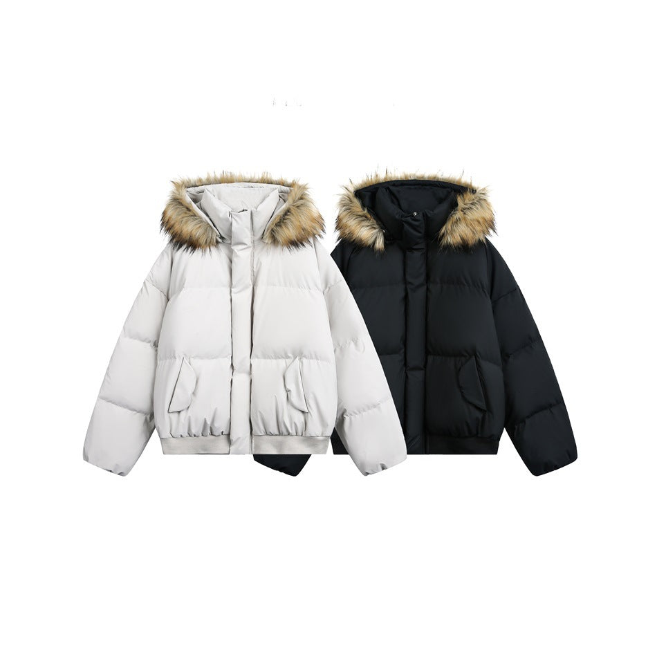 Two puffer jackets shown together in light beige and black, both with tan fur-trimmed hoods.