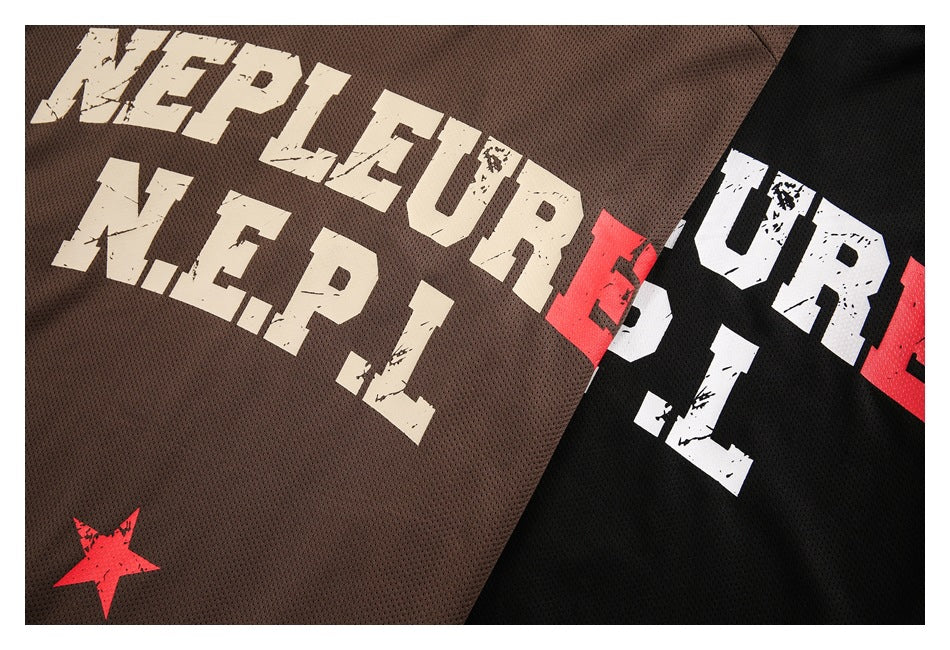 Close-up of brown and black mesh jerseys with distressed cream, white and red lettering and red star graphics.
