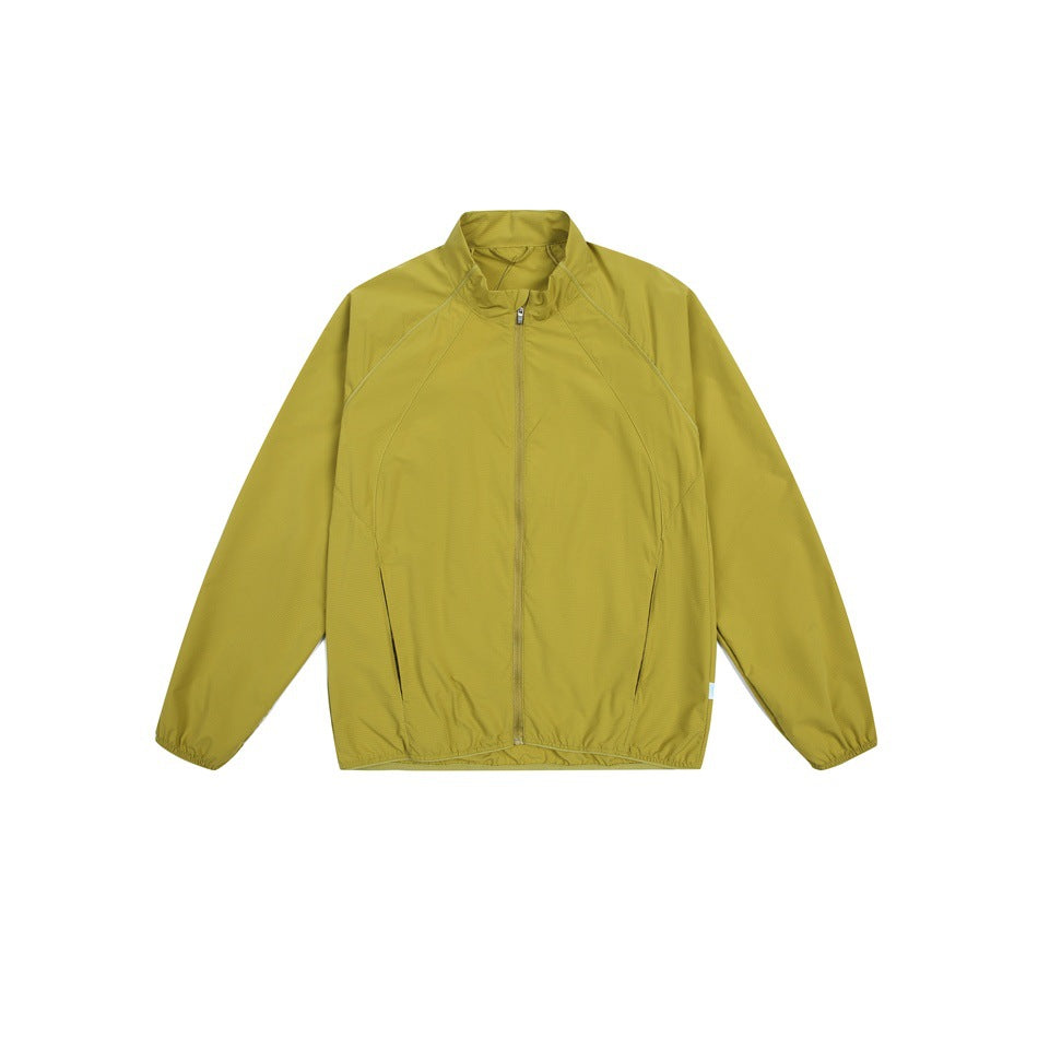 Yellow-green zip-up stand-collar jacket with side pockets and elastic hem, flat lay front view