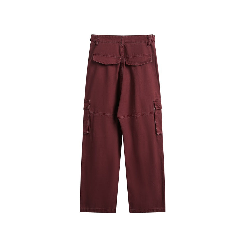 Back view of burgundy wide-leg cargo pants with two flap pockets and side cargo pockets.
