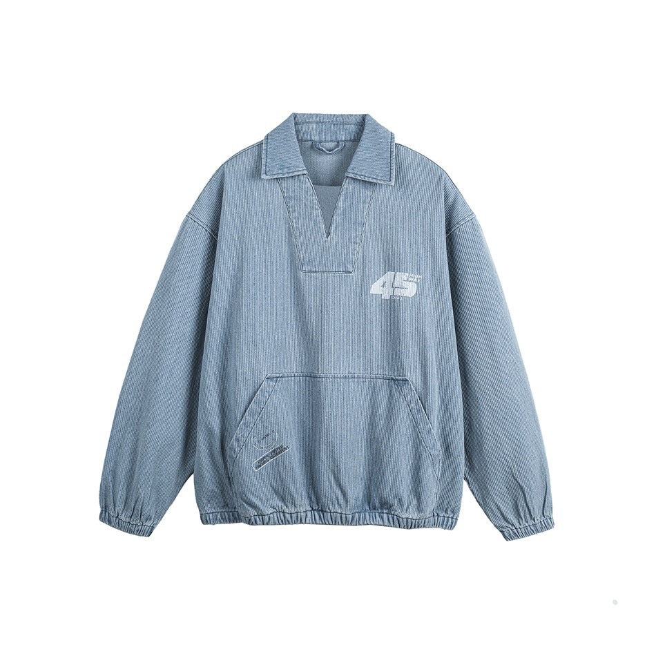 Washed blue pullover-style denim jacket with collar, V placket, kangaroo pocket and elastic cuffs, front view
