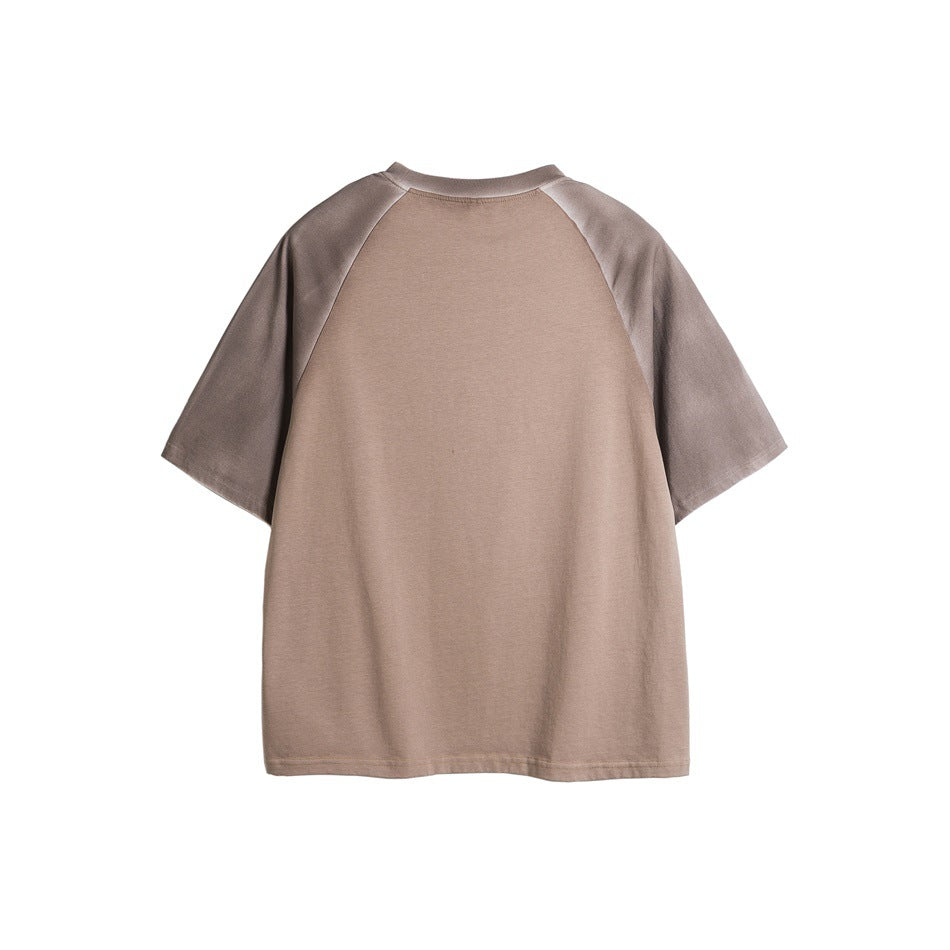Back view of coffee brown raglan T-shirt with faded taupe sleeves and a plain back, flat lay