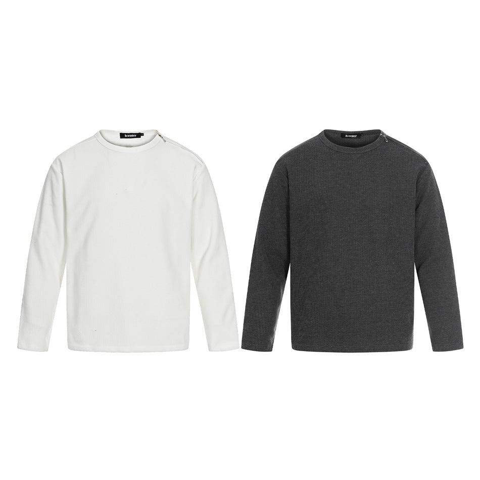 Two long-sleeve crew-neck shirts shown from the front: one white and one charcoal.