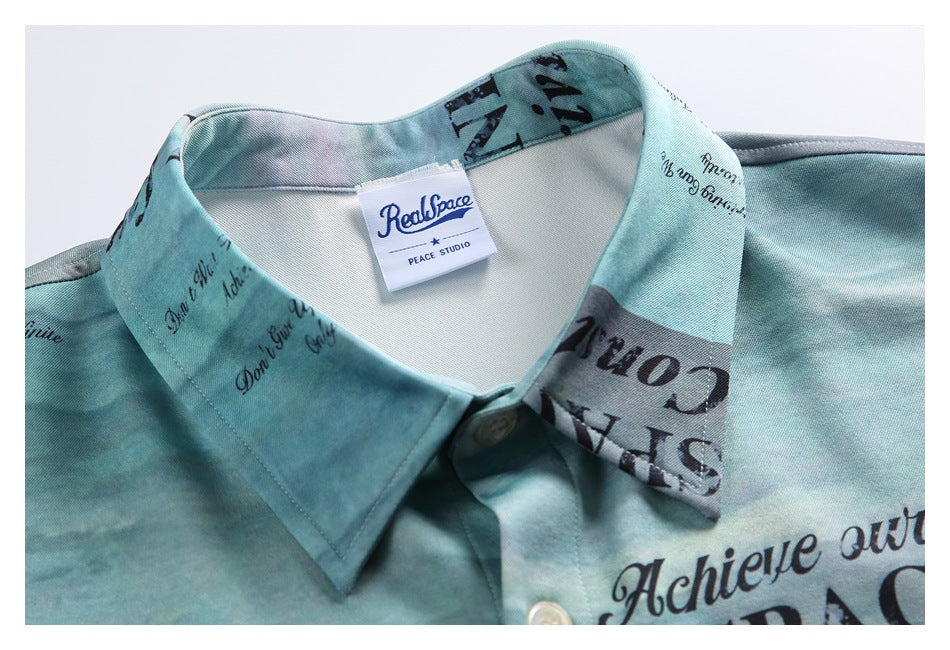 Close-up of the shirt's blue-green printed collar, top button and sewn-in RealSpace label.
