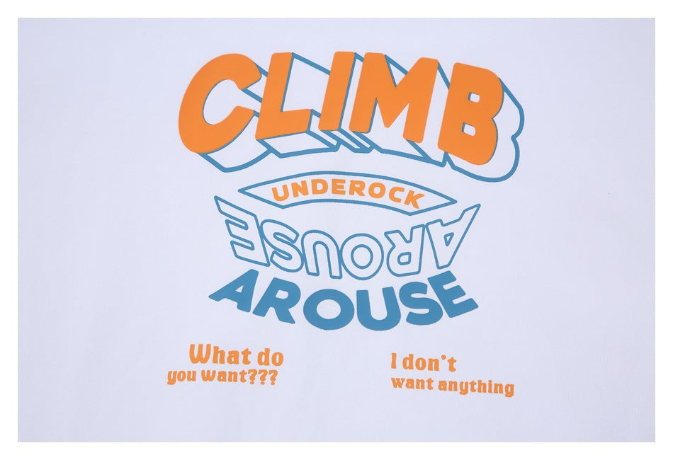 Close-up of the white T-shirt's orange and blue graphic, with bold lettering and smaller text.