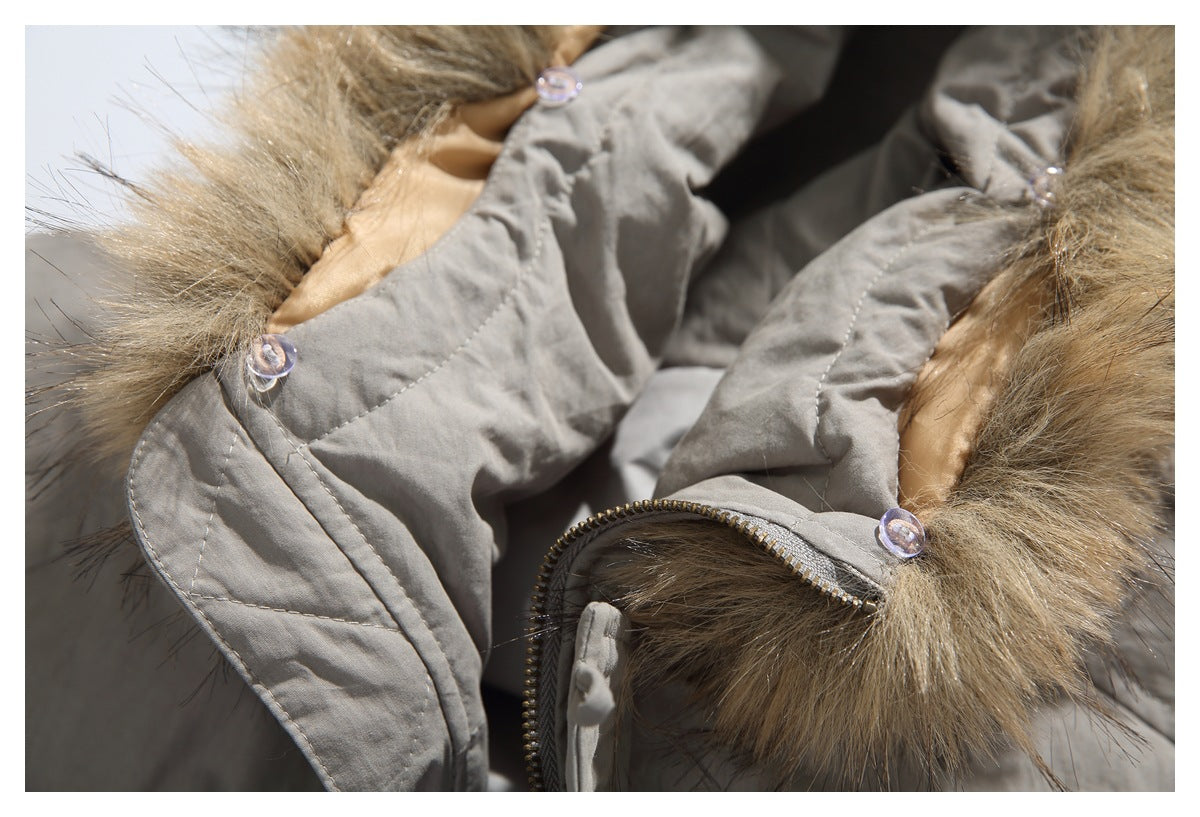 Close-up of the gray jacket's fur-trimmed hood, lining, and zipper opening.