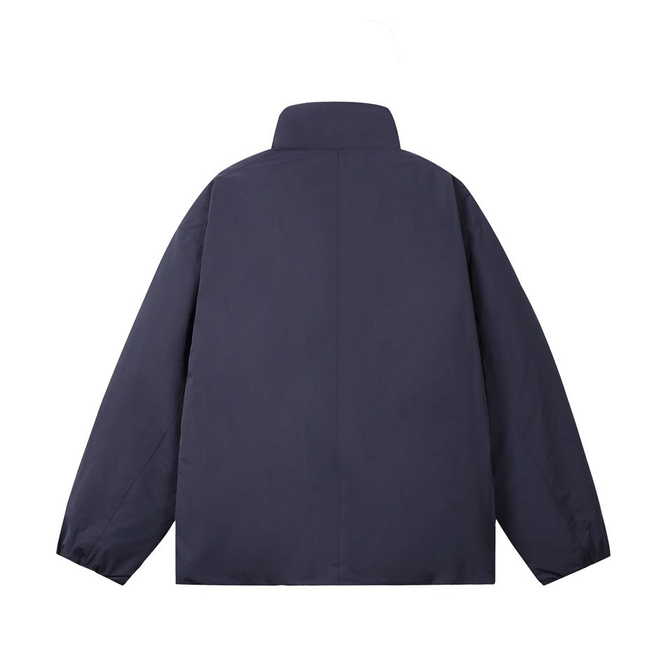 Navy padded stand-collar jacket back view showing plain back panel with center seam and elasticated cuffs