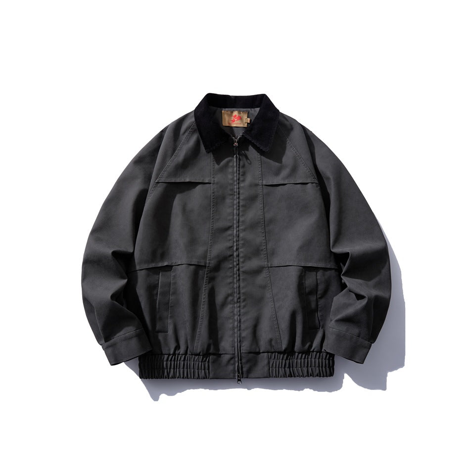 Dark gray zip-front jacket with black corduroy collar, paneled front, pockets and elastic hem, flat lay front view