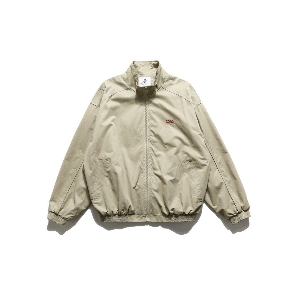 Khaki zip-up stand-collar jacket, front flat lay, with small red embroidered logo and elastic cuffs and hem