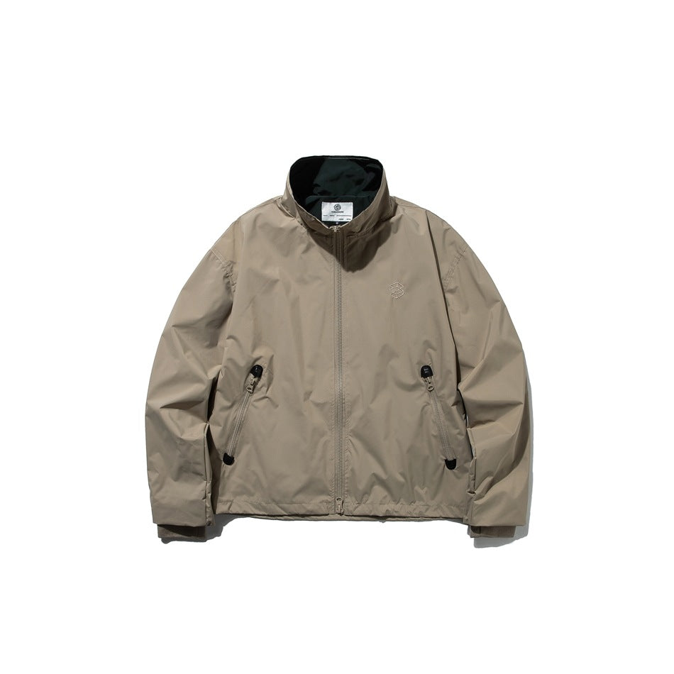 Khaki stand-collar zip jacket flat lay with diagonal zip pockets, chest embroidery and dark green inner collar