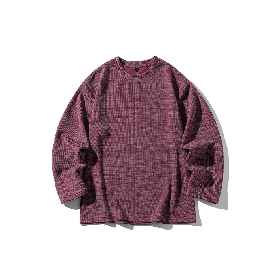 Red-purple heathered long-sleeve crew-neck pullover laid flat, front view