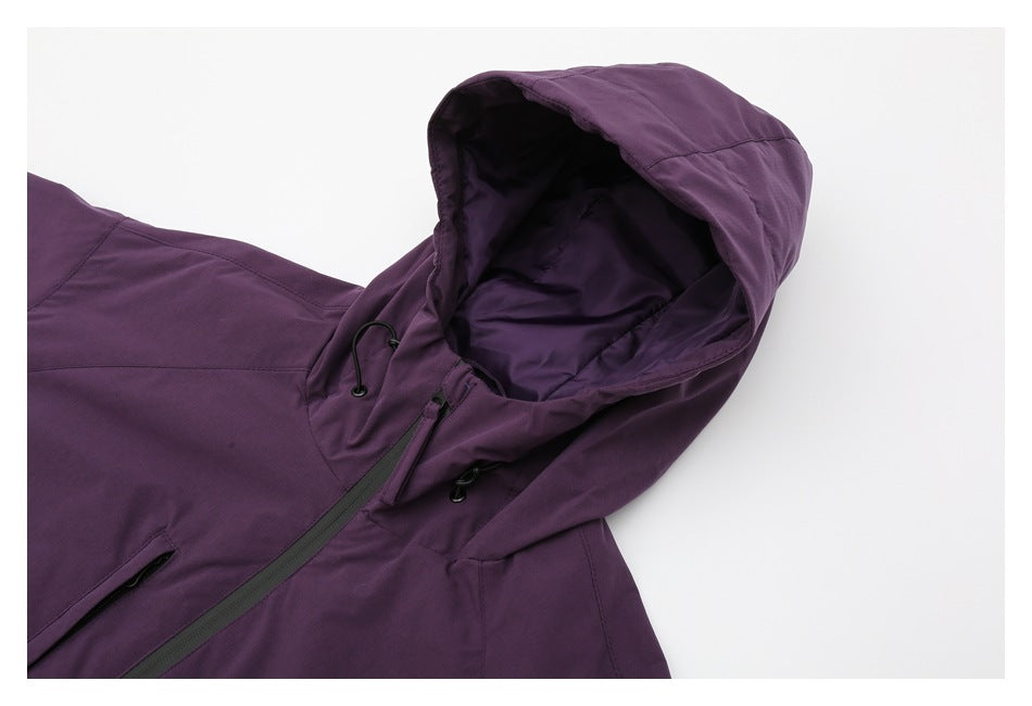 Close-up of the deep-purple jacket's hood lining, drawcords, and upper front zipper.
