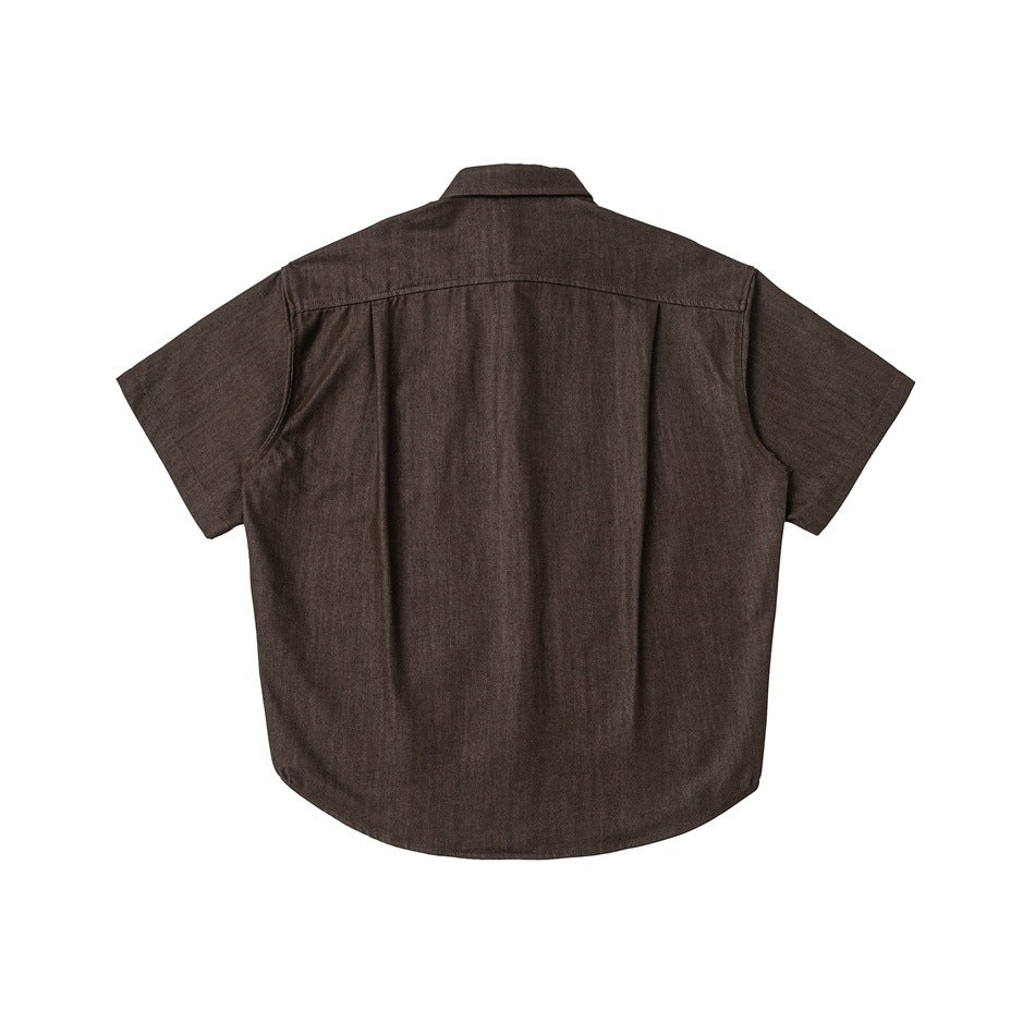 Back view of a dark brown short-sleeve collared shirt on a white background.