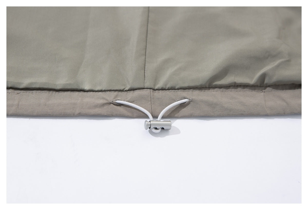 Close-up of the jacket hem with an adjustable drawcord and toggle.