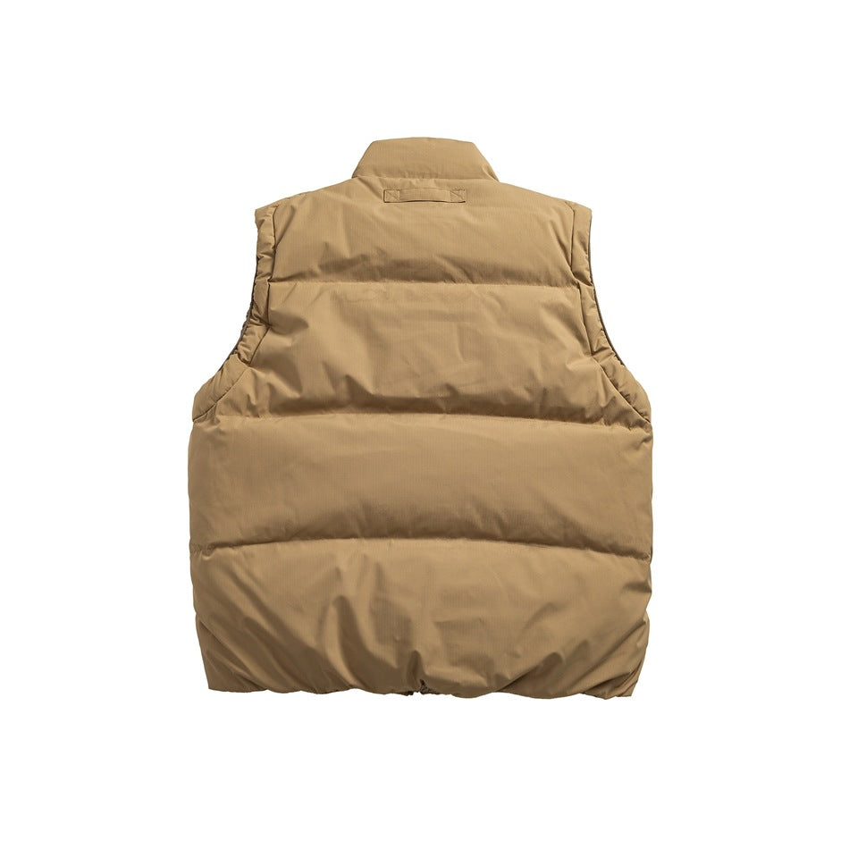 Back view of khaki quilted puffer vest with horizontal baffles, stand collar and small loop tab at the neck