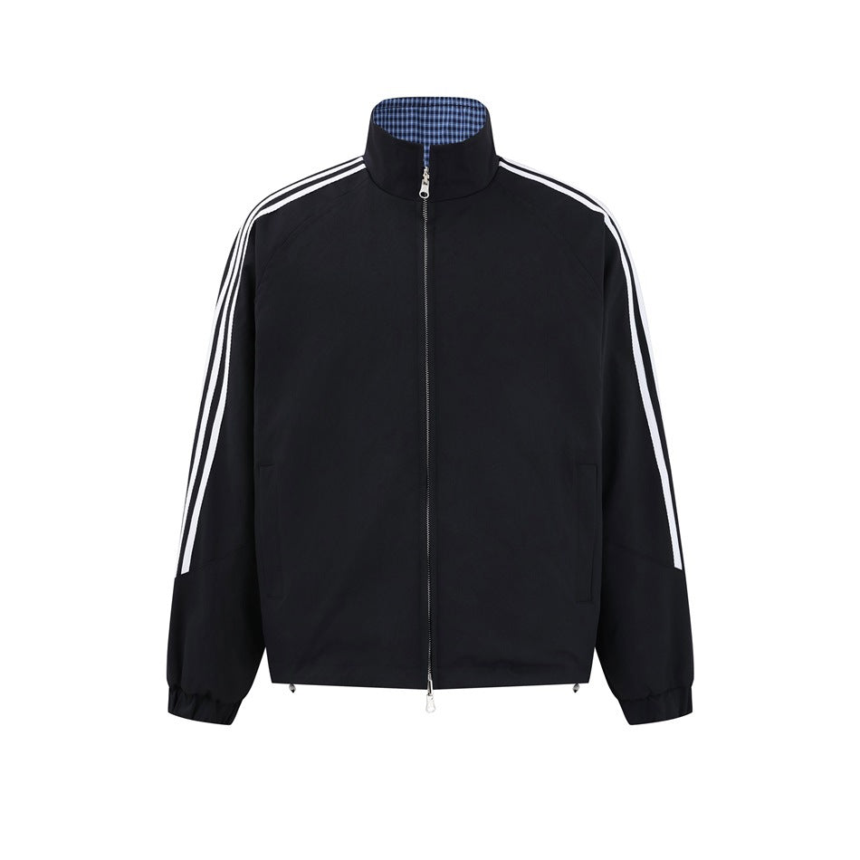 Black stand-collar zip jacket with white sleeve stripes and blue check collar lining, front view