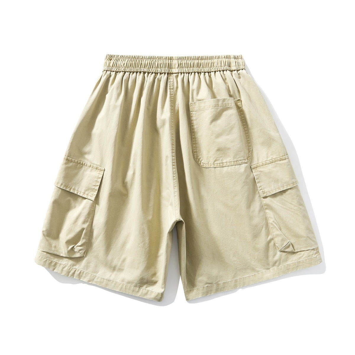 Back view of beige wide-leg cargo shorts with an elastic waistband, rear pocket, and large side cargo pockets.