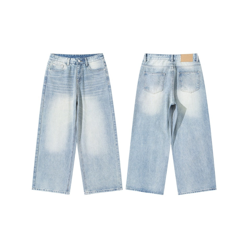 Full-length front and back views of light-wash, wide-leg jeans laid flat on a white background.