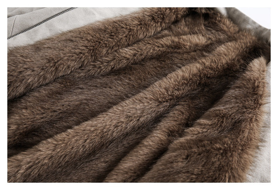 Close-up of the jacket's plush brown fur lining beside the taupe outer fabric.
