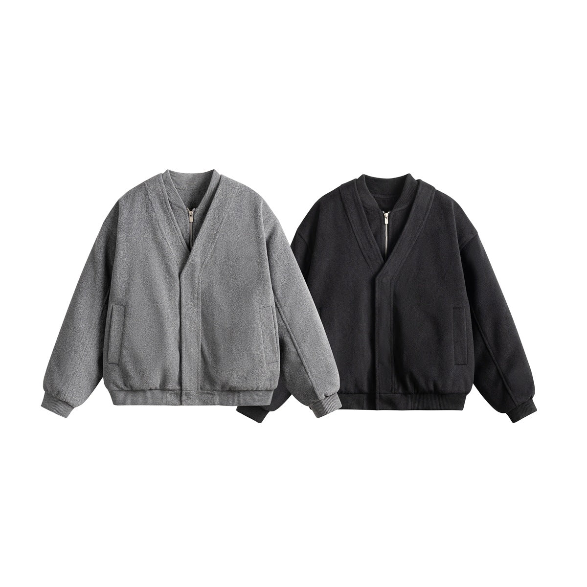 Front view of two zip-front jackets with ribbed trim and pockets, in gray and black.