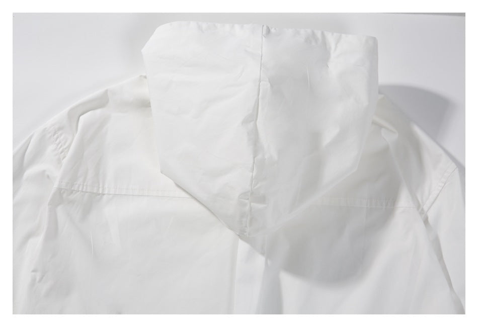 Back view of a white hooded garment laid flat, showing the hood and horizontal back seam.