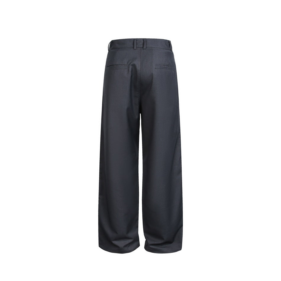 Back view of charcoal wide-leg trousers with belt loops and two welt pockets.