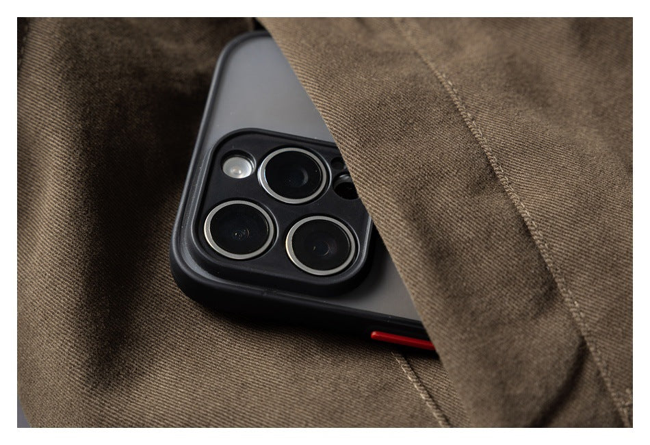 Close-up of a brown garment pocket holding a smartphone.