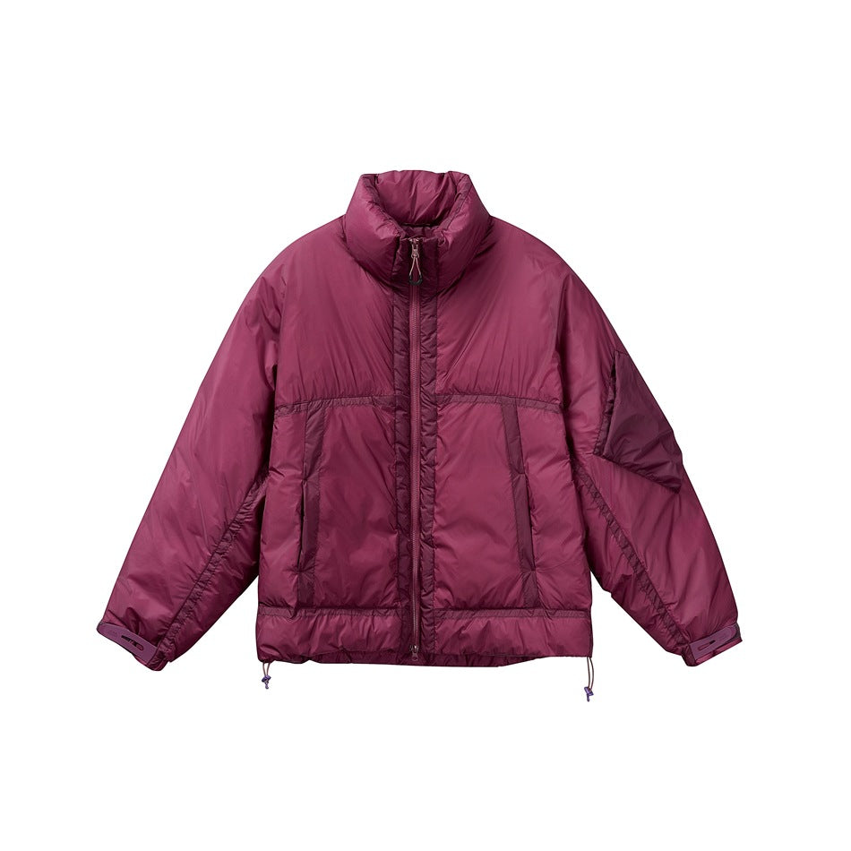 Burgundy quilted stand-collar puffer jacket with front zipper, taped pockets and drawcord hem, flat front view