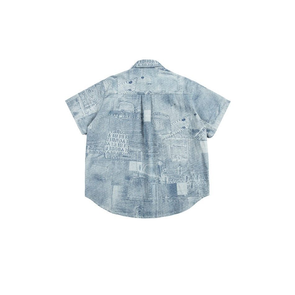 Back view of light blue short-sleeve shirt with all-over faded jeans-style patchwork print, flat lay