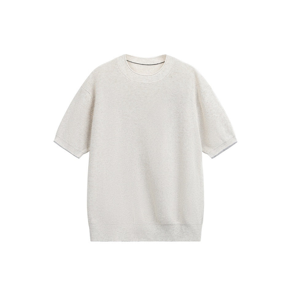Off-white ribbed knit short-sleeve crew neck top flat lay with light gray trim at the sleeve cuffs