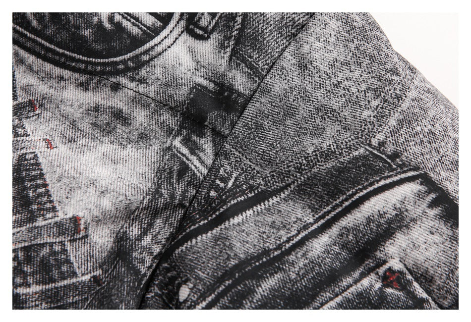 Close-up of the jacket's neckline and shoulder seam in a black-and-gray abstract print.