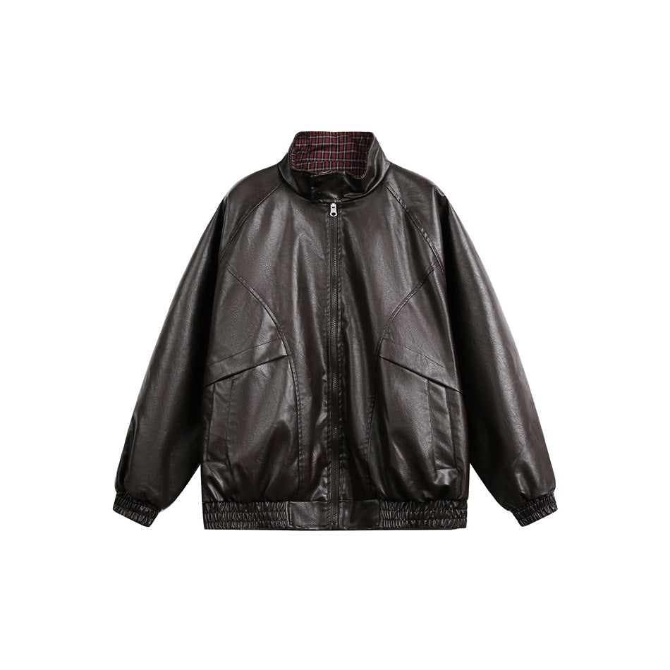 Front view of a dark brown zip-front jacket with a stand collar, curved seams, and gathered cuffs and hem.