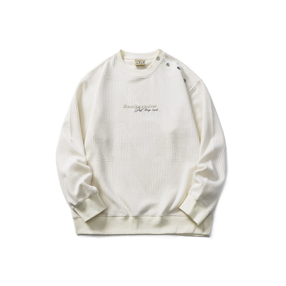 Cream textured geometric-pattern crewneck sweatshirt, front flat lay, with shoulder buttons and chest embroidery