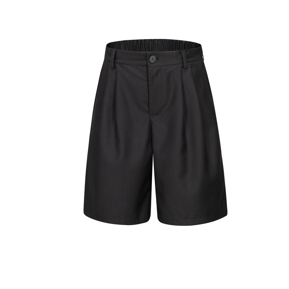 Black pleated knee-length shorts, front view, with button closure, belt loops and elastic waistband