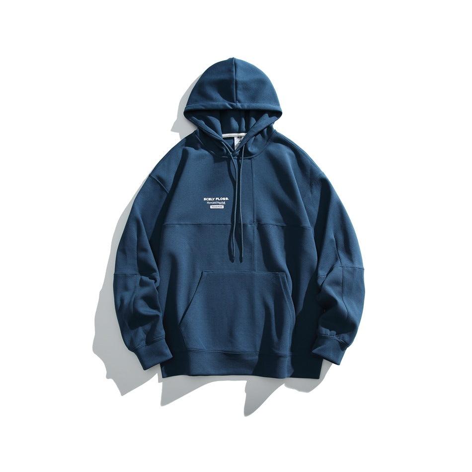 Lake blue pullover hoodie flat lay with drawstring hood, kangaroo pocket, paneled seams and small chest print