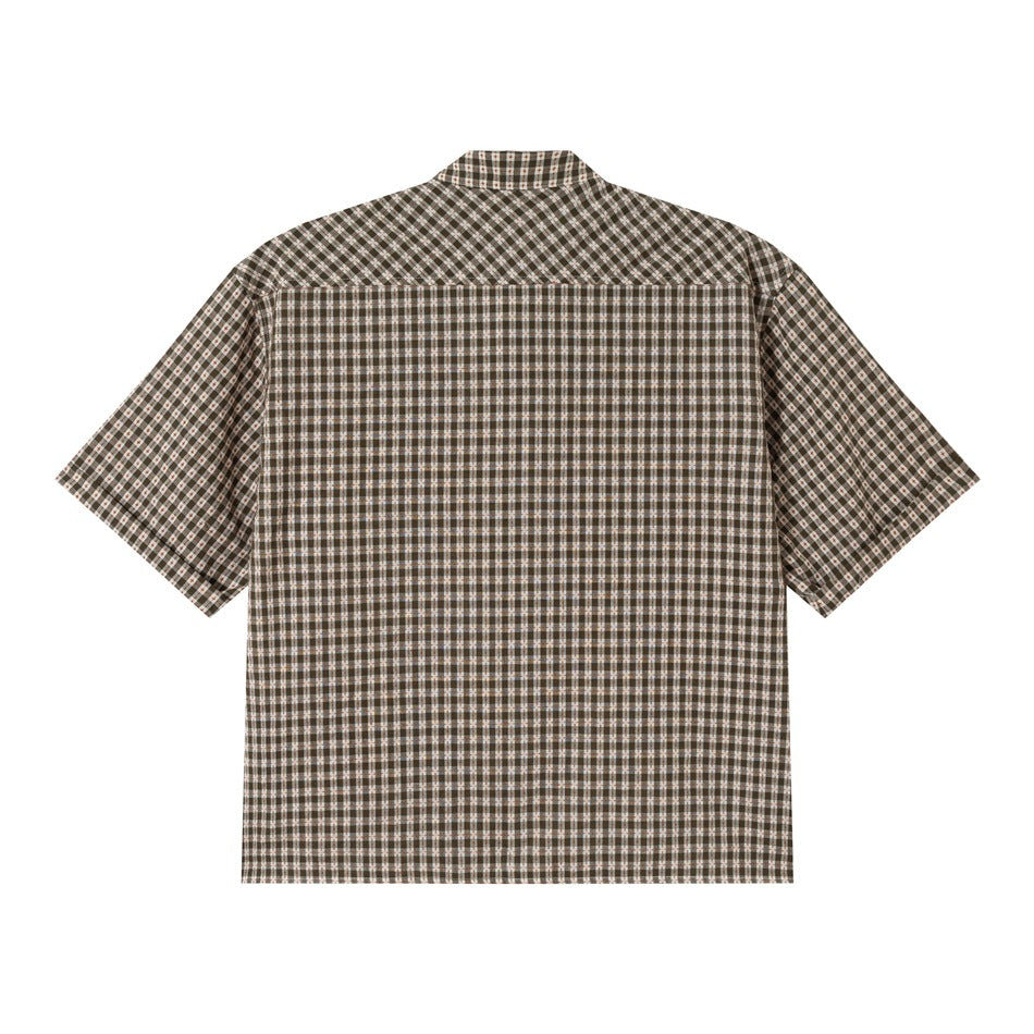 Flat back view of a short-sleeve brown and cream plaid shirt with a back yoke seam and cuffed sleeves